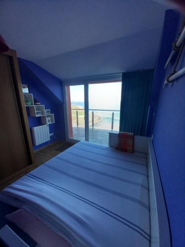Cama ou camas em um quarto em Ático, maravillosas vistas al mar