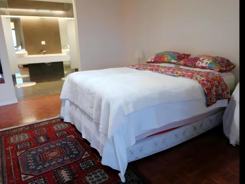 מיטה או מיטות בחדר ב-Casa con vistas al Mar