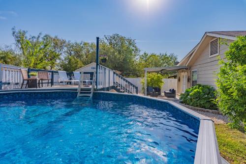 a swimming pool in front of a house at Superb House by SeaWorld, Private POOL & GameRoom in San Antonio