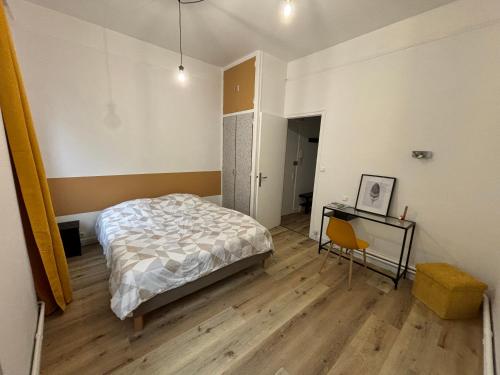 Postel nebo postele na pokoji v ubytování 43 Proche centre