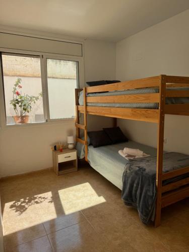 Postel nebo postele na pokoji v ubytování Apartamento Los Peces