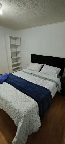 Habitaciones en Curico tesisinde bir odada yatak veya yataklar