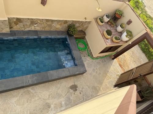 an overhead view of a swimming pool in a house at SON DE MAR in Bolonia