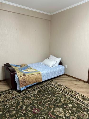 Un pat sau paturi într-o cameră la Guesthouse Djal