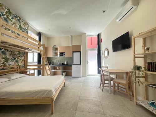 Kuchyň nebo kuchyňský kout v ubytování Calma Lofts