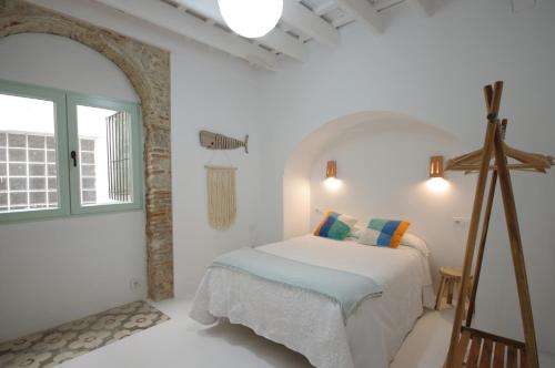 Tempat tidur dalam kamar di 140 La Posada del Viento