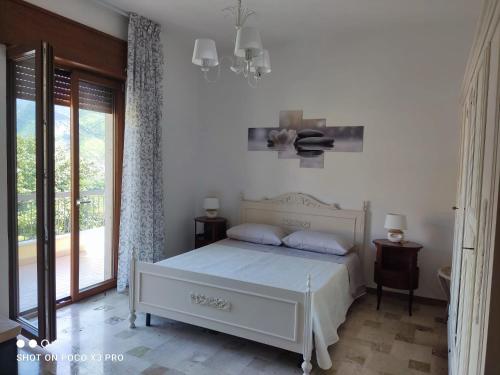 Postel nebo postele na pokoji v ubytování Residenza Regina Margherita, Apud Montes