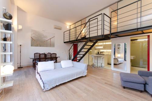 Χώρος καθιστικού στο Esclusivo loft con due camere da letto e terrazzo