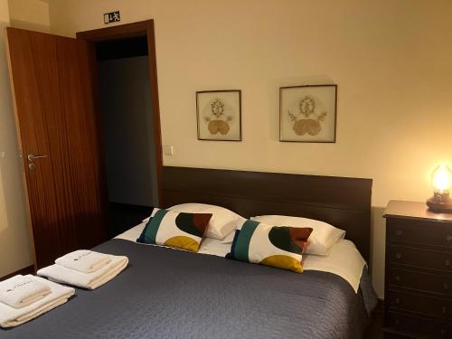 Katil atau katil-katil dalam bilik di Bergui Guesthouse - Em Guimarães desde 2017