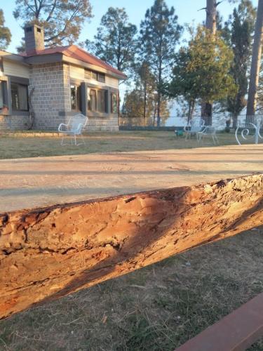 a piece of wood laying on the side of a road at Batrasi Dak Bungalow in Uttar Shisha