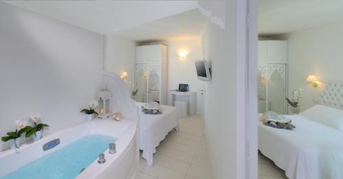 Ένα ή περισσότερα κρεβάτια σε δωμάτιο στο Hotel Al Cavallino Bianco