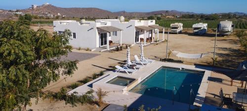 an aerial view of a house with a swimming pool at Bungalow Vista Sierra Laguna in San Carlos