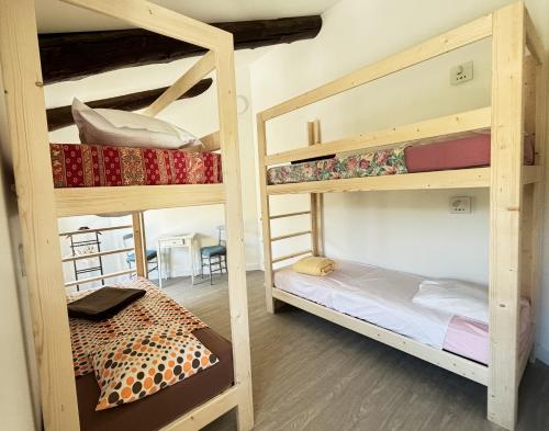 Postel nebo postele na pokoji v ubytování Gîte de l'Escanson un temps pour soi