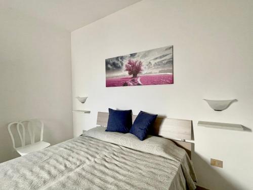 Postel nebo postele na pokoji v ubytování Casa Artemide - Primo piano indipendente con vista mare
