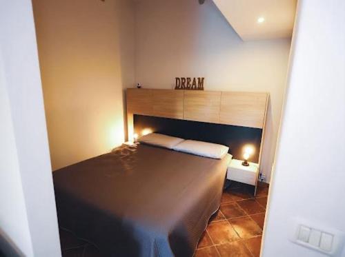 Postel nebo postele na pokoji v ubytování Il laghetto 19