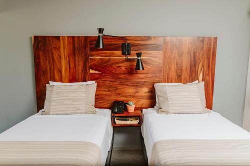 Ένα ή περισσότερα κρεβάτια σε δωμάτιο στο Unique Suite Twin Room in Exclusive Boutique Hotel Cabo