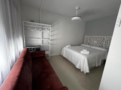 Ένα ή περισσότερα κρεβάτια σε δωμάτιο στο Casa Eliseo