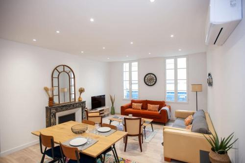 O zonă de relaxare la Appartement neuf en plein cœur de la Bastide
