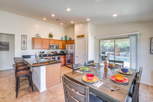 a kitchen and dining room with a table and chairs at Backyard Oasis Updated San Tan Valley Escape in San Tan Valley