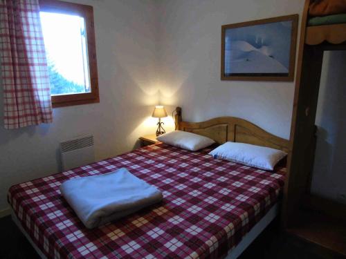 Кровать или кровати в номере Résidence Belvedere - 3 Pièces pour 8 Personnes MAE-8874