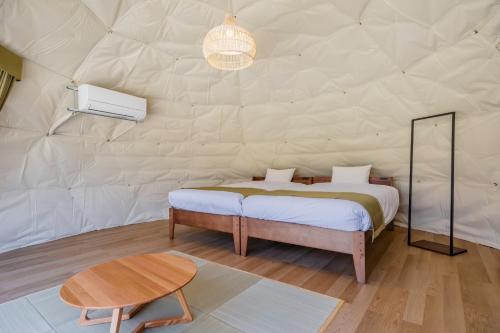 Llit o llits en una habitació de NAGOMI CAMP - Vacation STAY 48652v