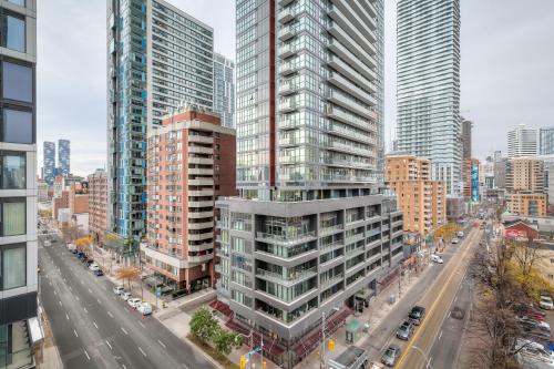 an aerial view of a city with tall buildings at Panorama Suites Downtown Toronto in Toronto