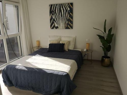 Postel nebo postele na pokoji v ubytování High Standing Suites Premium in Liège