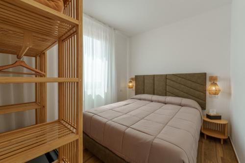 Кровать или кровати в номере Loft Olbia Centro