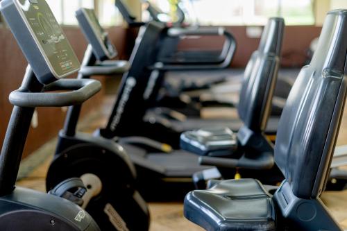 a row of cardio machines in a gym at Beach Park Resort - Suites in Aquiraz