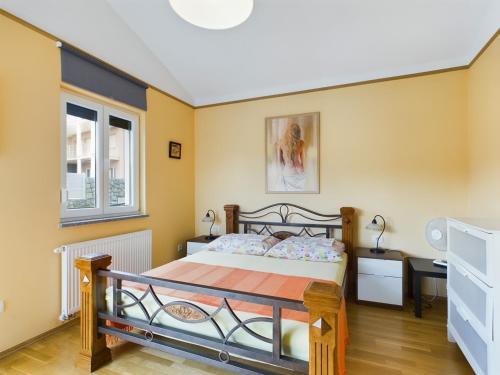 Giường trong phòng chung tại Villa Vila