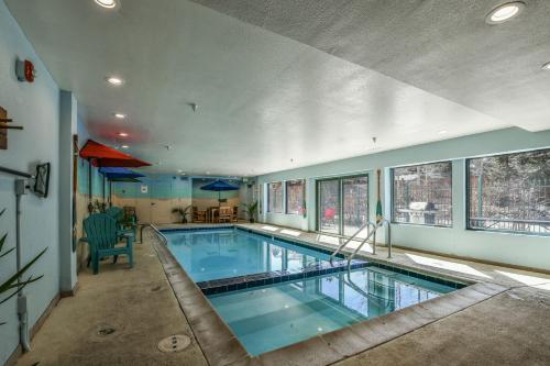 a large swimming pool in a large house at Studios in Gateway Lodge in Keystone