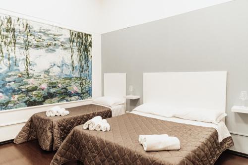Postel nebo postele na pokoji v ubytování B&B Art