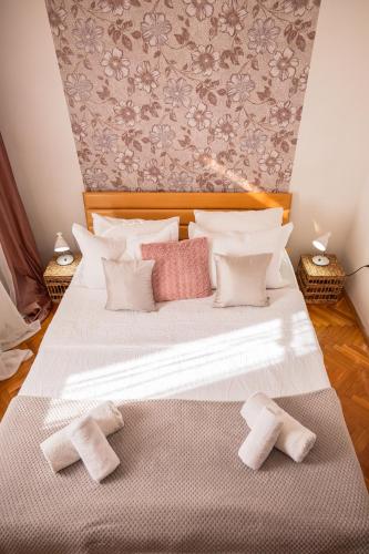 Postel nebo postele na pokoji v ubytování Apartman Emina