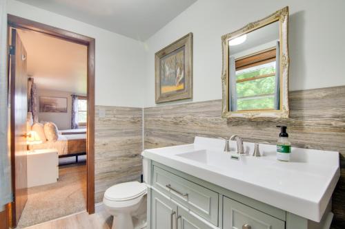 A bathroom at Inviting Twin Lakes Home with Indoor and Outdoor Bars!