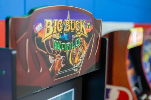 a video game on top of a computer monitor at Thematic House with Private pool and Game Room in Loughman
