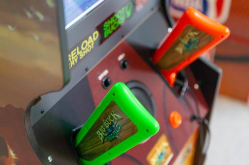 a close up of a video game machine at Thematic House with Private pool and Game Room in Loughman