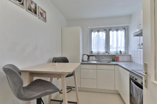 Kuchyň nebo kuchyňský kout v ubytování Moderne Ferienwohnungen - Service wie im Hotel