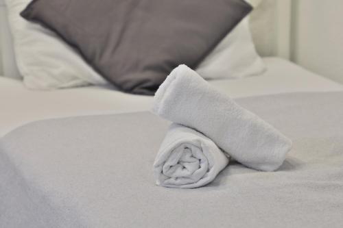 Postel nebo postele na pokoji v ubytování Moderne Ferienwohnungen - Service wie im Hotel