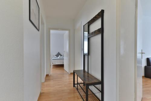 Postel nebo postele na pokoji v ubytování Moderne Ferienwohnungen - Service wie im Hotel