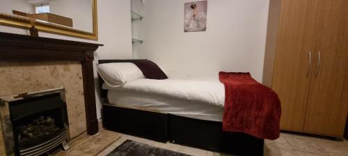 Letto o letti in una camera di Fleetway Private Rooms