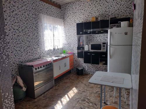 Kép CASA DE CAMPO chácara com piscina LARANJEIRAS szállásáról Juquitibában a galériában