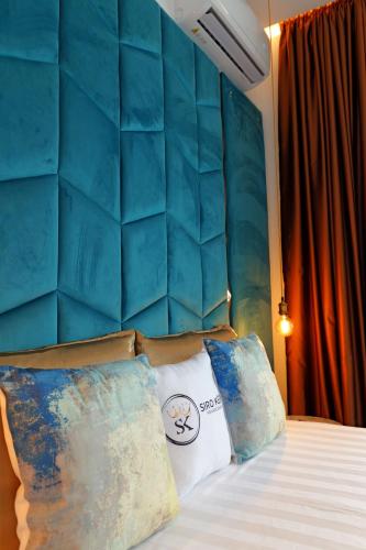 Cama o camas de una habitación en Siro Kerma Private Beach Villa