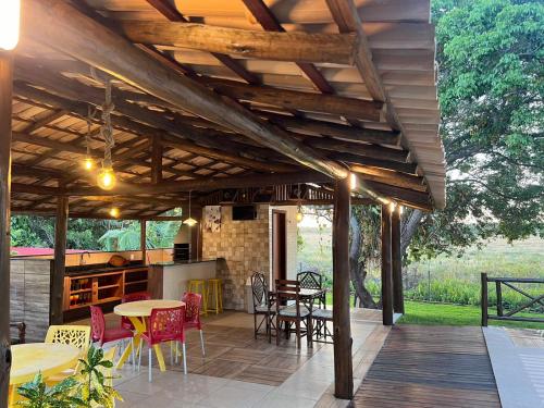 Taman di luar Casa 3/4 em itacimirim