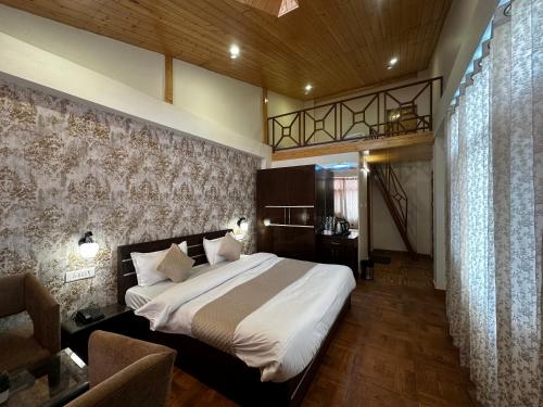 Ένα ή περισσότερα κρεβάτια σε δωμάτιο στο Tara Cottages