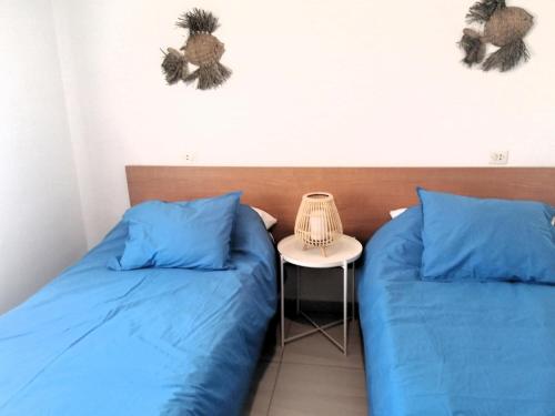 Appart 6 pers à Roses, à 80m de la plage avec terrasse, parking, WIFI et toutes commodités
