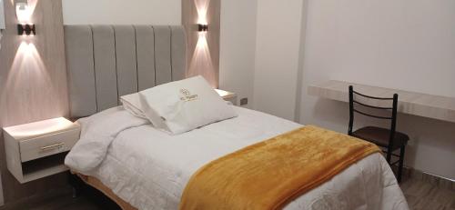 Krevet ili kreveti u jedinici u objektu Hotel El Virrey Suite