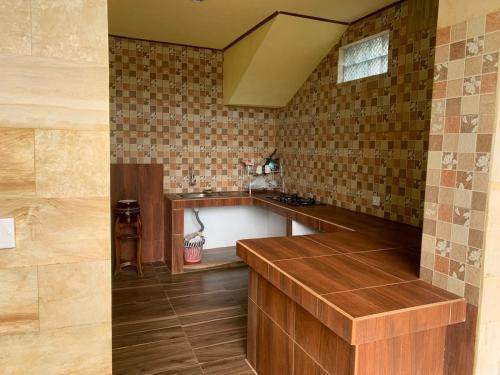 Kuchyň nebo kuchyňský kout v ubytování Baligen Bungalow