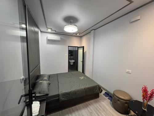 Ένα ή περισσότερα κρεβάτια σε δωμάτιο στο HOMESTAY ĐỒI GIÓ