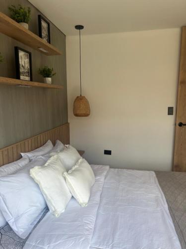 Ένα ή περισσότερα κρεβάτια σε δωμάτιο στο Casa Berlín, Lake Access