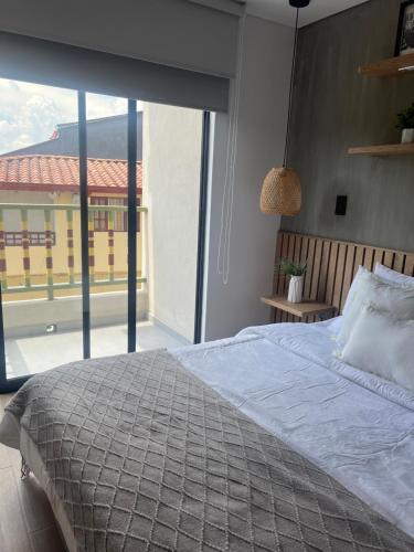 Ένα ή περισσότερα κρεβάτια σε δωμάτιο στο Casa Berlín, Lake Access